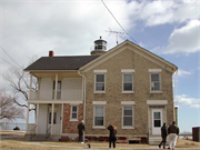 5117 4TH AVE, a Gabled Ell light house, built in Kenosha, Wisconsin in 1866.