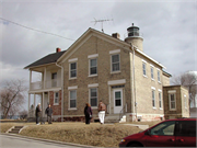 5117 4TH AVE, a Gabled Ell light house, built in Kenosha, Wisconsin in 1866.