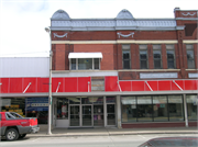 125 S WATER ST, a Romanesque Revival large retail building, built in Sparta, Wisconsin in 1896.