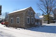 607 W MILWAUKEE RD, a Greek Revival house, built in Clinton, Wisconsin in 1843.