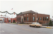 212 W MINER AVE, a Colonial Revival/Georgian Revival post office, built in Ladysmith, Wisconsin in 1935.