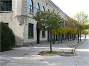 601-627 WILLIAMSON ST, a Romanesque Revival retail building, built in Madison, Wisconsin in 1898.