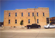 301 W MAIN AVE, a Commercial Vernacular small retail building, built in De Pere, Wisconsin in 1887.