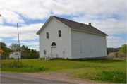 COUNTY HIGHWAY O, W OF STATE HIGHWAY 58, 4 MILES S OF MAUSTON, a Front Gabled church, built in Lindina, Wisconsin in 1859.