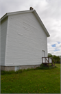 COUNTY HIGHWAY O, W OF STATE HIGHWAY 58, 4 MILES S OF MAUSTON, a Front Gabled church, built in Lindina, Wisconsin in 1859.