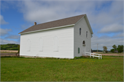 COUNTY HIGHWAY O, W OF STATE HIGHWAY 58, 4 MILES S OF MAUSTON, a Front Gabled church, built in Lindina, Wisconsin in 1859.