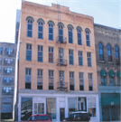 221-225-227 S 2ND ST, a Italianate large retail building, built in Milwaukee, Wisconsin in 1865.