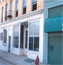 221-225-227 S 2ND ST, a Italianate large retail building, built in Milwaukee, Wisconsin in 1865.