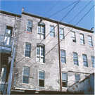 221-225-227 S 2ND ST, a Italianate large retail building, built in Milwaukee, Wisconsin in 1865.