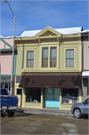 107 W EDGEWATER ST, a Italianate small retail building, built in Cambria, Wisconsin in 1888.