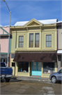 107 W EDGEWATER ST, a Italianate retail building, built in Cambria, Wisconsin in 1888.