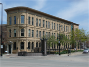 1 N PINCKNEY ST, a Italianate retail building, built in Madison, Wisconsin in 1871.