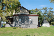 WATER ST, a Federal house, built in Prairie du Chien, Wisconsin in 1839.