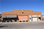 30 E SUMNER ST / 15 MILL ST, a Commercial Vernacular automobile showroom, built in Hartford, Wisconsin in 1929.