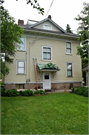 208 S CHERRY AVE, a Colonial Revival/Georgian Revival house, built in Marshfield, Wisconsin in 1904.
