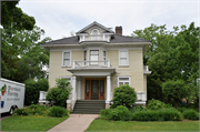 208 S CHERRY AVE, a Colonial Revival/Georgian Revival house, built in Marshfield, Wisconsin in 1904.