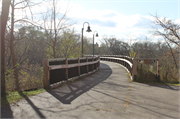 EAU CLAIRE RIVER, S OF FORMER UNIROYAL PLANT, a NA (unknown or not a building) bridge, built in Eau Claire, Wisconsin in 1910.