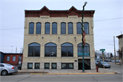 203 W LAKE ST, a Italianate large retail building, built in Lake Mills, Wisconsin in 1892.