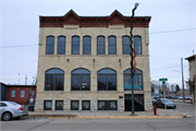 203 W LAKE ST, a Italianate retail building, built in Lake Mills, Wisconsin in 1892.