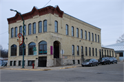 203 W LAKE ST, a Italianate large retail building, built in Lake Mills, Wisconsin in 1892.