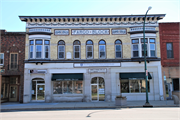 122-128 E LAKE ST, a Queen Anne bank/financial institution, built in Lake Mills, Wisconsin in 1893.