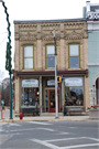 103 N MAIN ST, a Commercial Vernacular small retail building, built in Lake Mills, Wisconsin in 1854.