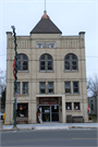 211 N MAIN ST, a Romanesque Revival theater/opera house/concert hall, built in Lake Mills, Wisconsin in 1888.