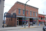 112 S MAIN ST, a Commercial Vernacular large retail building, built in Lake Mills, Wisconsin in 1907.