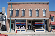 112 S MAIN ST, a Commercial Vernacular large retail building, built in Lake Mills, Wisconsin in 1907.