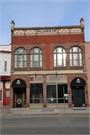103-105 S MAIN ST, a Romanesque Revival large retail building, built in Lake Mills, Wisconsin in 1895.