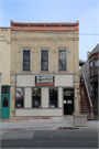 201 N MAIN ST, a Commercial Vernacular retail building, built in Lake Mills, Wisconsin in 1881.