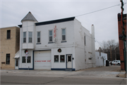 119 S MAIN ST, a Commercial Vernacular livery, built in Lake Mills, Wisconsin in 1891.