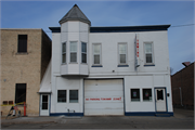 119 S MAIN ST, a Commercial Vernacular livery, built in Lake Mills, Wisconsin in 1891.