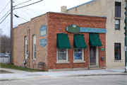 125 S MAIN ST, a Commercial Vernacular small office building, built in Lake Mills, Wisconsin in 1903.