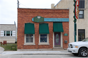 125 S MAIN ST, a Commercial Vernacular small office building, built in Lake Mills, Wisconsin in 1903.