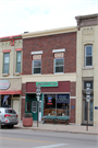 320 E MAIN ST, a Commercial Vernacular retail building, built in Waupun, Wisconsin in 1913.