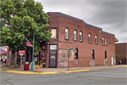 102-106 WALNUT ST, a Commercial Vernacular tavern/bar, built in Spooner, Wisconsin in 1904.