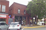 102-106 WALNUT ST, a Commercial Vernacular tavern/bar, built in Spooner, Wisconsin in 1904.