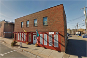 509 FRONT ST, a Commercial Vernacular large retail building, built in Spooner, Wisconsin in 1945.