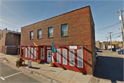 509 FRONT ST, a Commercial Vernacular retail building, built in Spooner, Wisconsin in 1945.