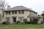 9032 JACKSON PARK BLVD, a Colonial Revival/Georgian Revival house, built in Wauwatosa, Wisconsin in 1941.