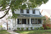 2327 N 63rd Street, a Dutch Colonial Revival house, built in Wauwatosa, Wisconsin in 1925.