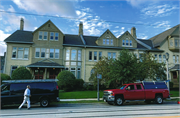 1019-1043 E OGDEN AVE, a Queen Anne row house/townhouse, built in Milwaukee, Wisconsin in 1889.