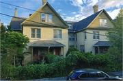 1019-1043 E OGDEN AVE, a Queen Anne row house/townhouse, built in Milwaukee, Wisconsin in 1889.