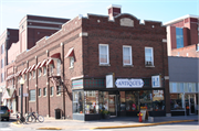 244 MAIN ST E, a Commercial Vernacular small retail building, built in Menomonie, Wisconsin in 1922.