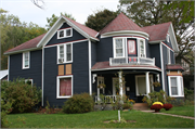1303 MAIN ST E, a Queen Anne house, built in Menomonie, Wisconsin in 1880.