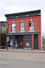 1812 HALL AVE, a Commercial Vernacular small retail building, built in Marinette, Wisconsin in 1883.