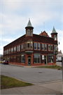 1821 HALL AVE, a Queen Anne retail building, built in Marinette, Wisconsin in 1890.