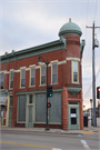 1821 HALL AVE, a Queen Anne retail building, built in Marinette, Wisconsin in 1890.