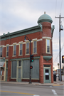 1821 HALL AVE, a Queen Anne large retail building, built in Marinette, Wisconsin in 1890.